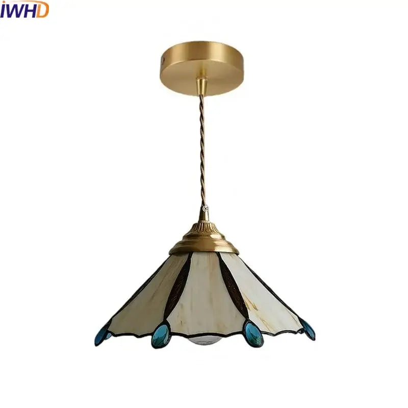 Gold-toned Japanese stained glass led pendant light with cream dark brown and teal glass panels for kitchen island decor
