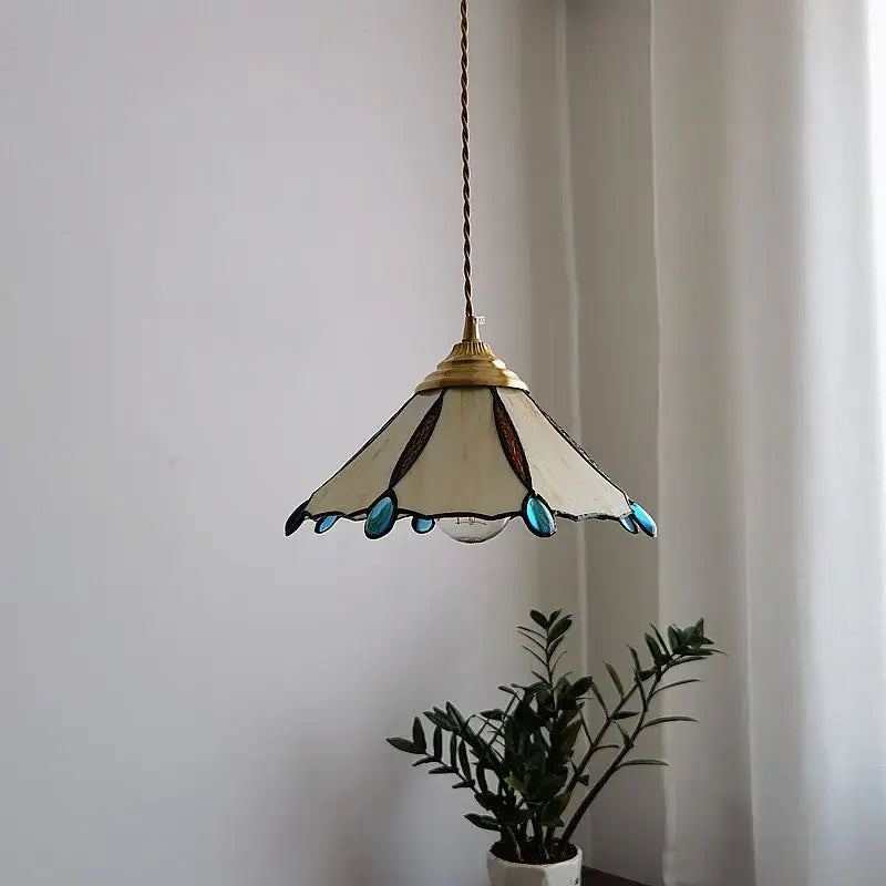 Vintage-style japanese stained glass led pendant light with cream shade and teal brown leaf accents for kitchen island decor