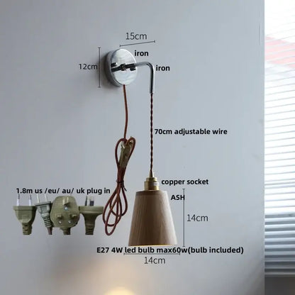 Japanese style black and brass wall lamp with pull chain features polished iron bracket, adjustable copper wire, and ash wood shade