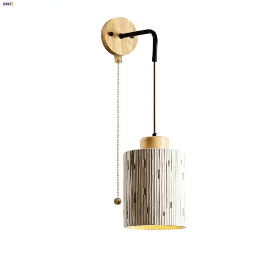 A rustic decorbites japanese style led wood wall light with white and gray textured shade and brass pull chain for bedroom