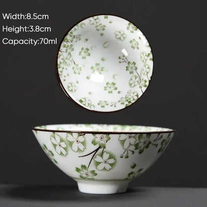 White ceramic kung fu tea cup with green cherry blossom patterns and dark brown rim for dining room decorbites blue set
