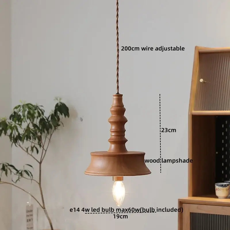 A warm-toned wooden pendant light with tiered handcrafted design and 200cm adjustable wire suspension japanese style decorbites