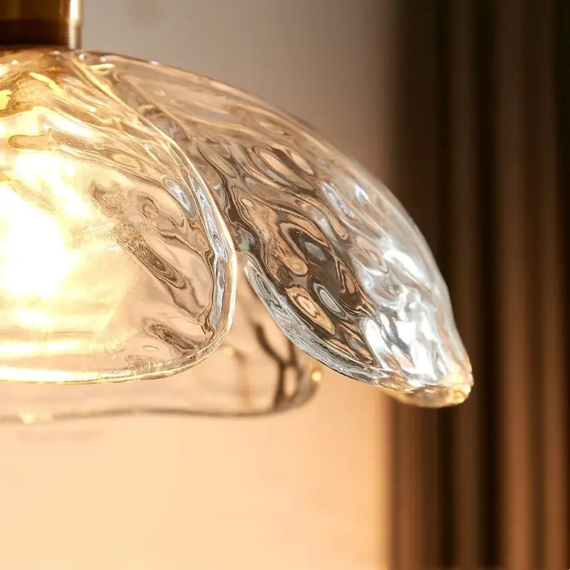 Japanese style pendant lamp with clear hand-blown glass and warm golden glow for dining room wood trim decorbites clear glass