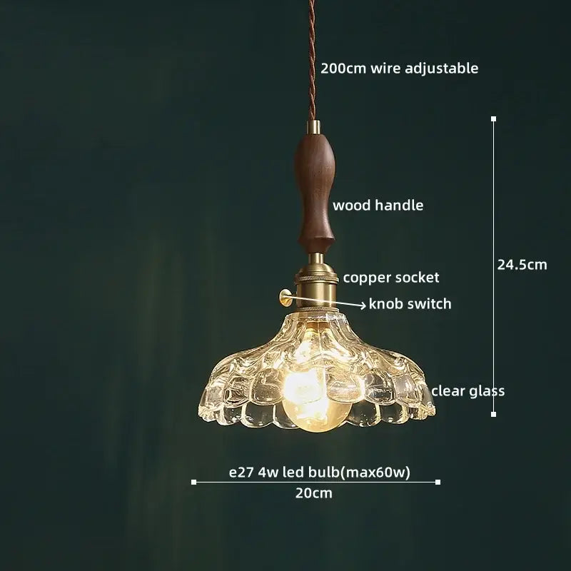 Japanese style clear glass pendant lamp with scalloped flower shade, dark wood handle, and brass copper socket decorbites clear glass