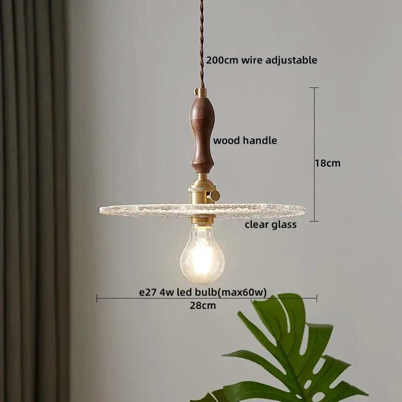 Japanese style clear glass pendant lamp with dark wood handle and brass hardware for dining room decorbites pendant lamp