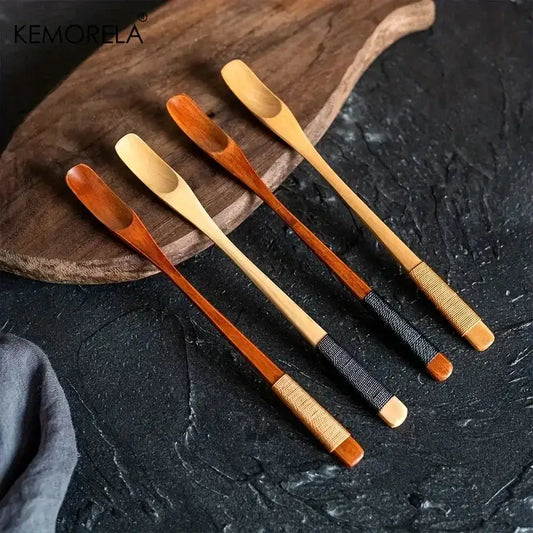 Set of four japanese style wooden spoons with woven handle wraps in natural and dark wood tones for kitchen use