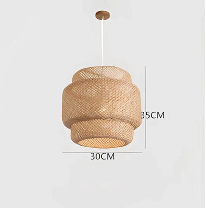 Natural woven rattan japanese style pendant light with tiered cylindrical layers and wooden ceiling mount for intimate spaces
