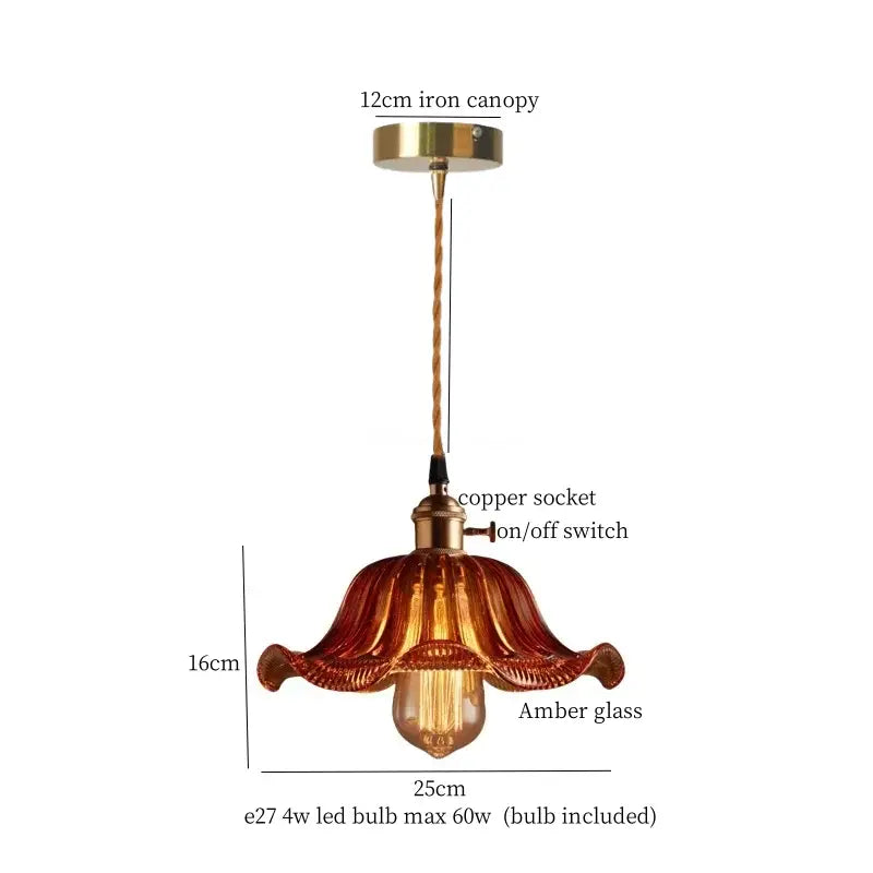 A 16cm tall japanese vintage brass and wood glass led pendant lamp with copper socket and amber flower-shaped shade