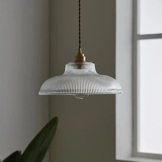 Japanese warm brass ribbed glass pendant light with clear glass and twisted brown cord for dining room lighting