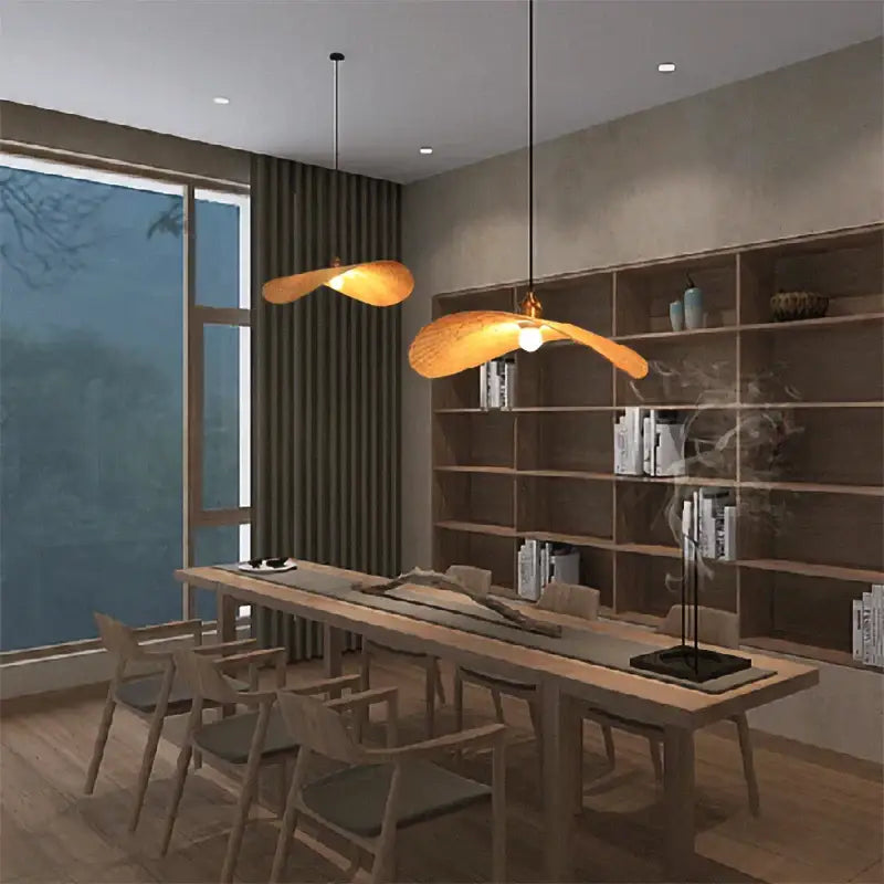 Two warm-toned leaf-shaped pendant lights of decorbites bamboo chandelier for living room hanging from ceiling
