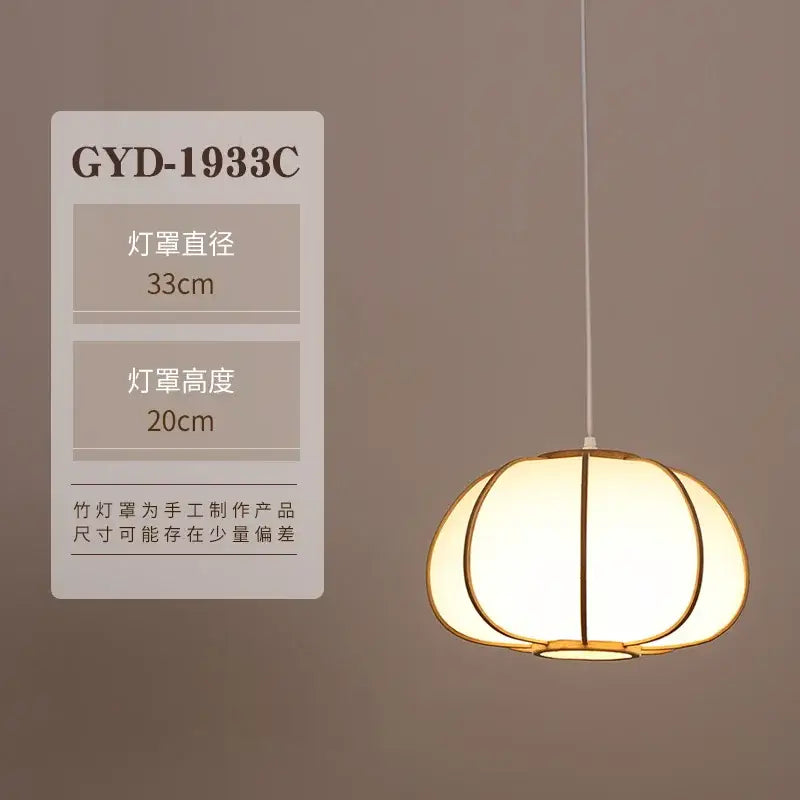 A warm glowing bamboo pendant lamp with segmented frame and white shade for tea room or living room decorbites bamboo pendant