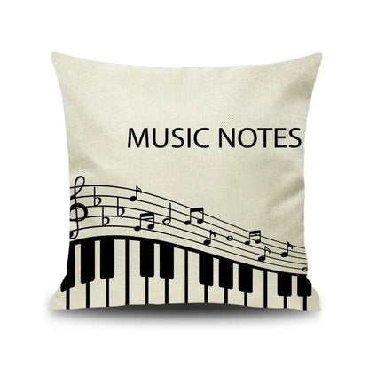 Beige linen throw pillow with black notes piano graphic and music notes text for living room decorbites letter notes decor