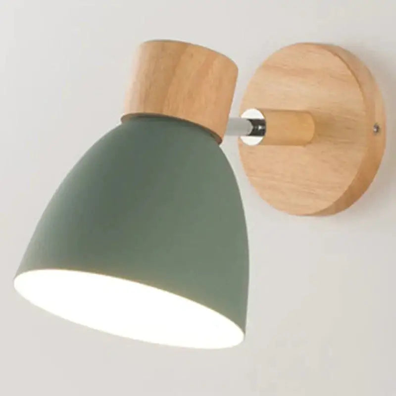 Joan wooden reading wall lamp with matte sage green conical shade and natural wood accents for bedroom lighting