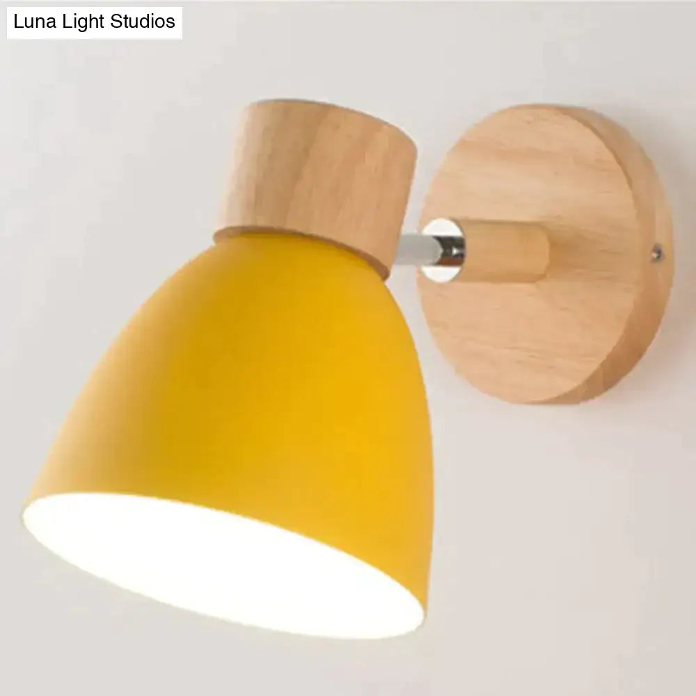 Joan wooden reading wall lamp with yellow conical lampshade and natural wood base for bedroom lighting
