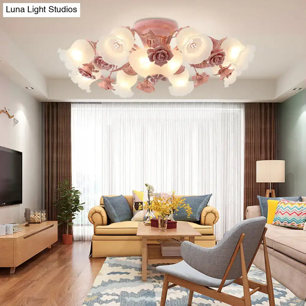 A korean garden flower ceiling light with delicate pink and white rose-shaped frost glass shades for bedroom decor