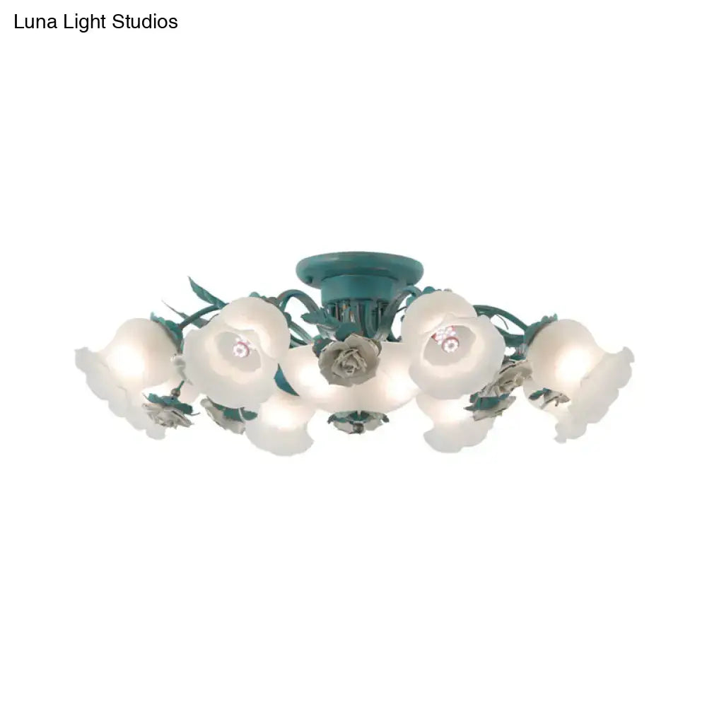 Teal metal ceiling fixture with frosted white glass korean garden flower shades and gray rose accents for bedroom lighting