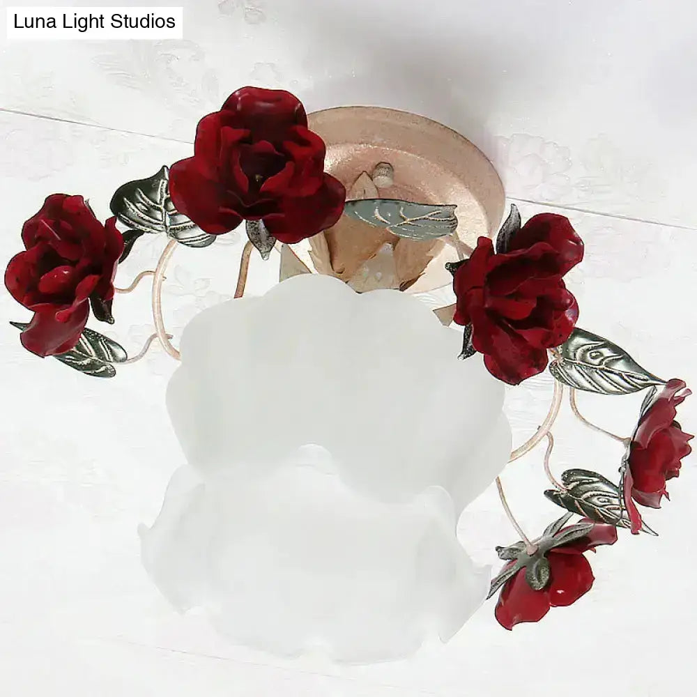 A frost white glass korean garden ruffle semi flush mount lamp with deep red velvet roses and silver-toned leaves