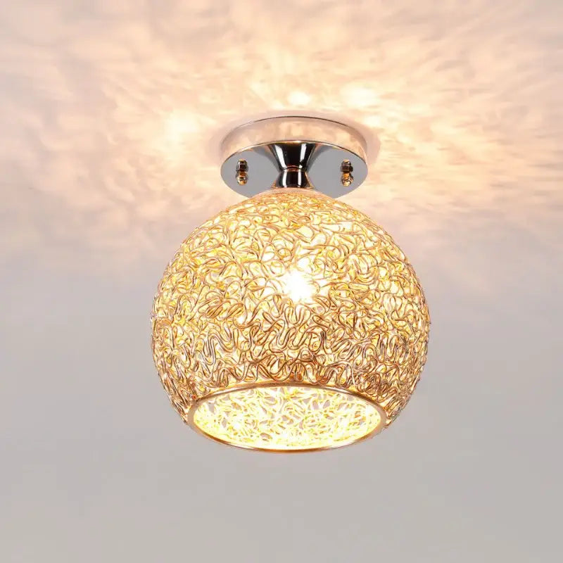 Gold-toned spherical lace pattern glass ball led ceiling light with woven metal filigree and chrome base for living room decorbites ceiling lights