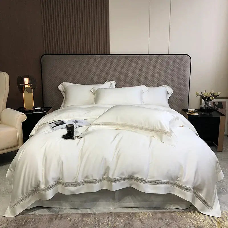 White satin bedding set with delicate silver embroidery hem made from decorbites eucalyptus lyocell luxury fabric