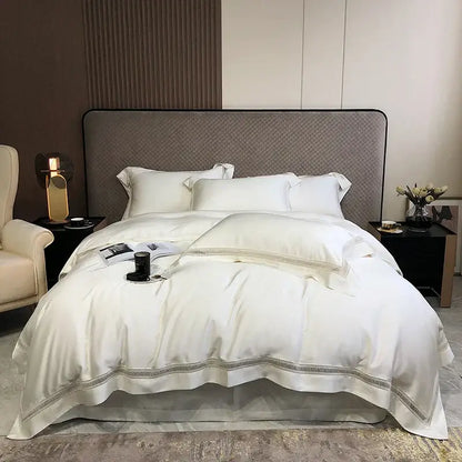 White satin bedding set with delicate silver embroidery hem made from decorbites eucalyptus lyocell luxury fabric