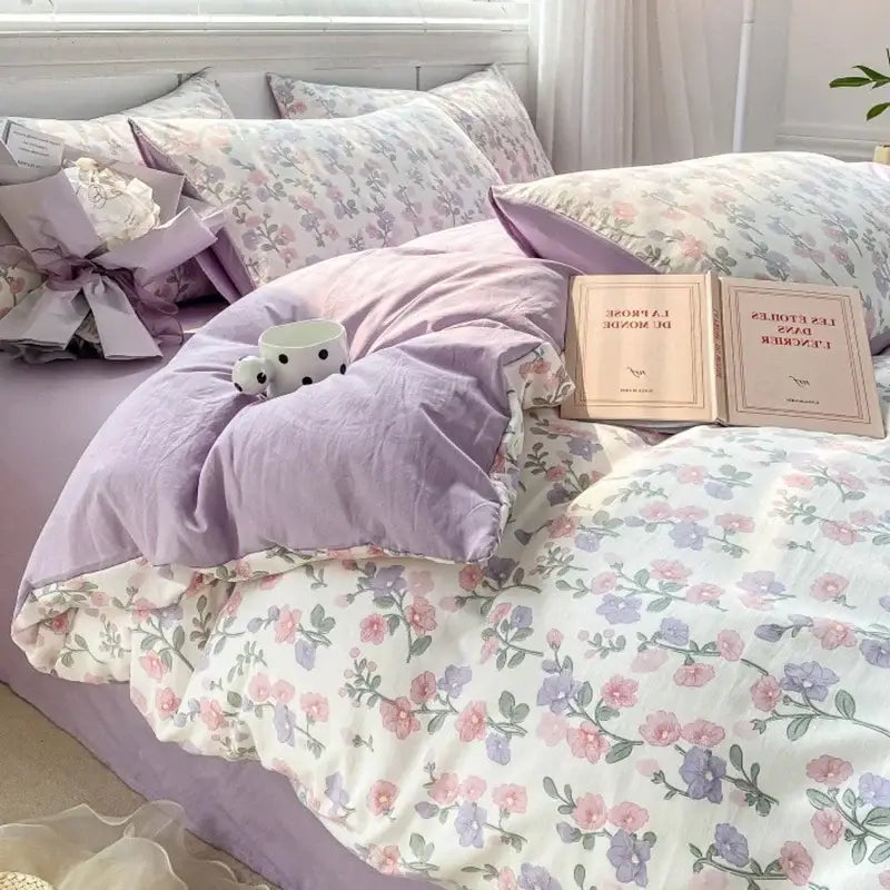 Lavender and pink floral double layer yarn bed sheet set made of soft cotton fabric for a cozy bedroom setup