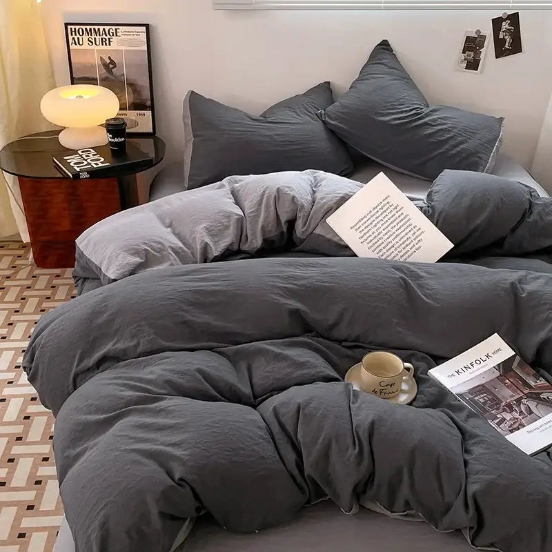 Gray textured cotton bedding set with matching pillows featuring a cozy rumpled appearance for soft cotton bedding