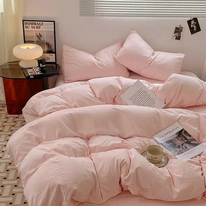 Pink quilted cotton bedding set with soft plush texture and matching pillows for comfortable bedroom use