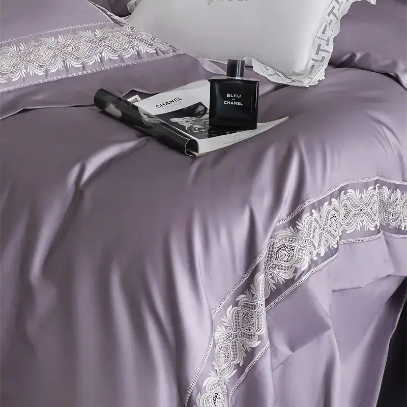 Lavender satin bedding set with intricate white lace embroidery trim featuring decorbites 1200tc egyptian luxe