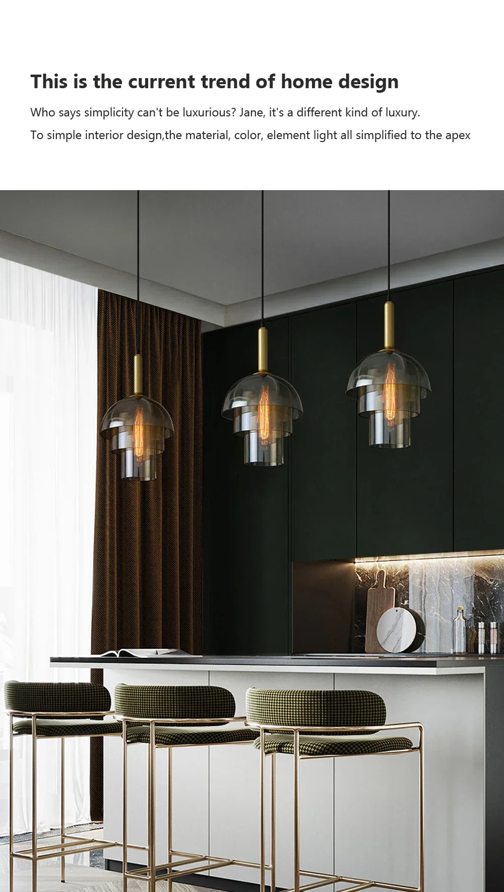 Three modern led vintage art champagne glass pendant lamps with gold metal frames hanging above a kitchen island