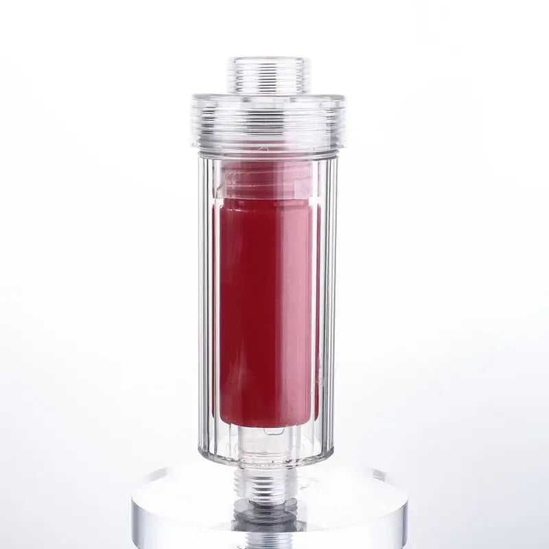 Transparent cylindrical vitamin c shower filter with red cartridge and metallic caps for decorbites lemon vitamin care