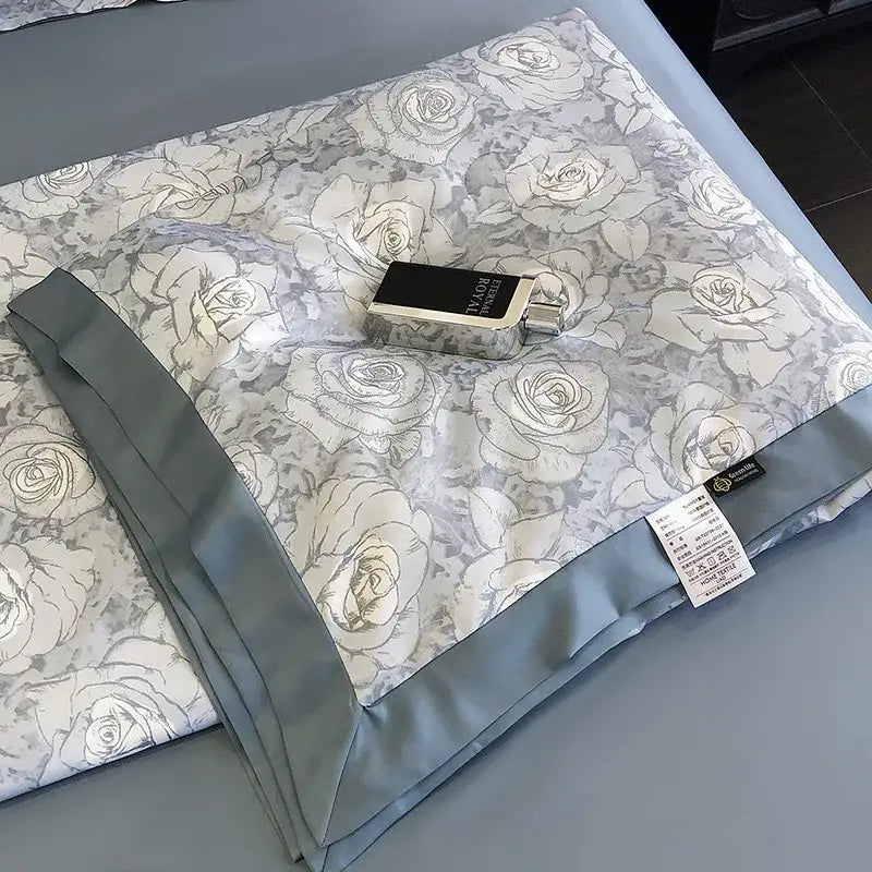 Gray rose-patterned satin bedspread with elegant sheen and folded edges pairs with decorbites leopard print pillow sham