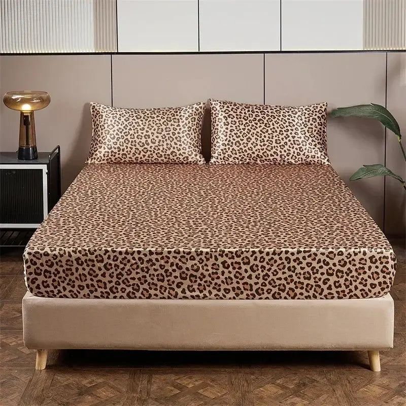 Leopard print satin bedsheet set in beige and brown tones with a glossy finish for stylish bedroom bedding