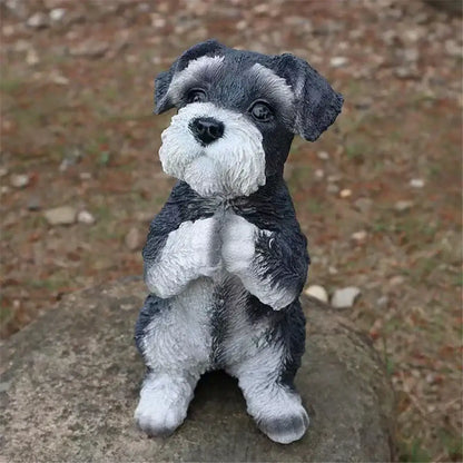 Detailed black and white resin miniature schnauzer dog sculpture with textured fur sitting on rock by decorbites dog sculpture