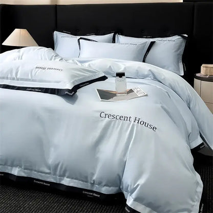 Light blue and black ice silk duvet cover bed set with crescent house branding by decorbites for bedroom decor