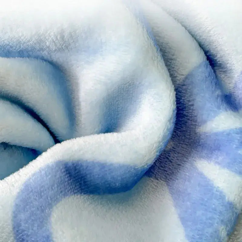 Soft plush light blue and white swirl milk velvet blanket by decorbites cozy milk for bedroom and travel use