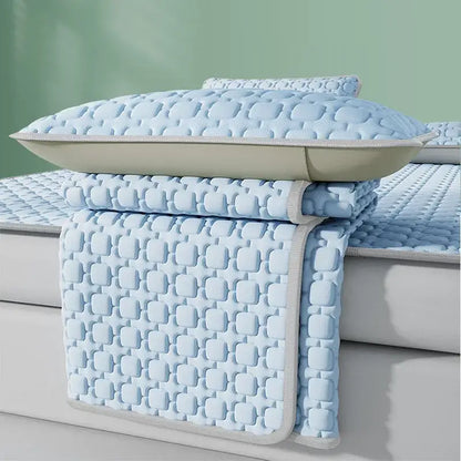 Light blue and beige quilted decorbites cooling latex pad mattress pad with matching pillow for bedroom use