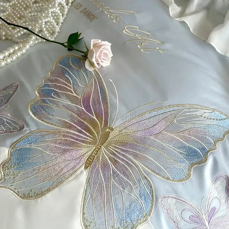 Light blue butterfly embroidery bedding set with delicate iridescent thread on soft white satin decorbites french lace