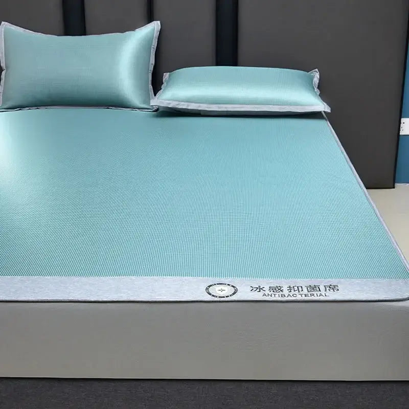Light blue cooling jacquard fitted sheet mattress protector with textured surface silver border and antibacterial feature