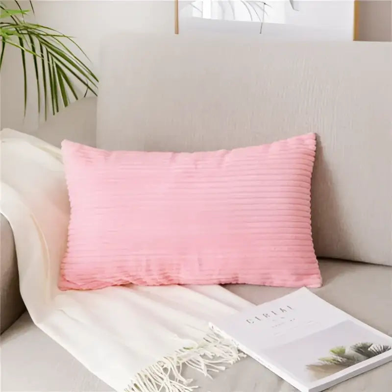Pink corduroy rectangular pillow resting on beige sofa featuring decorbites corduroy flocking pillow cover decor