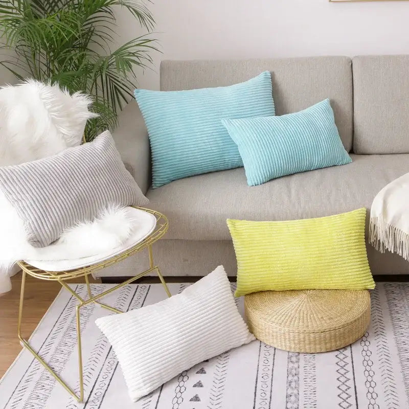 Light blue corduroy flocking pillow cover with vertical ribs on gray sofa for living room decorbites decor