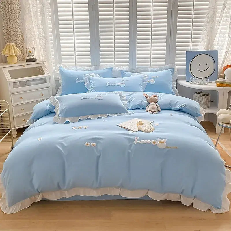 Light blue cotton bedding set with white ruffled trim and decorbites cartoon embroidery for bedroom decor