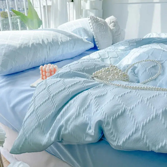 Light blue diamond grid jacquard bedding sets featuring a quilted duvet and matching pillows for bedroom comfort