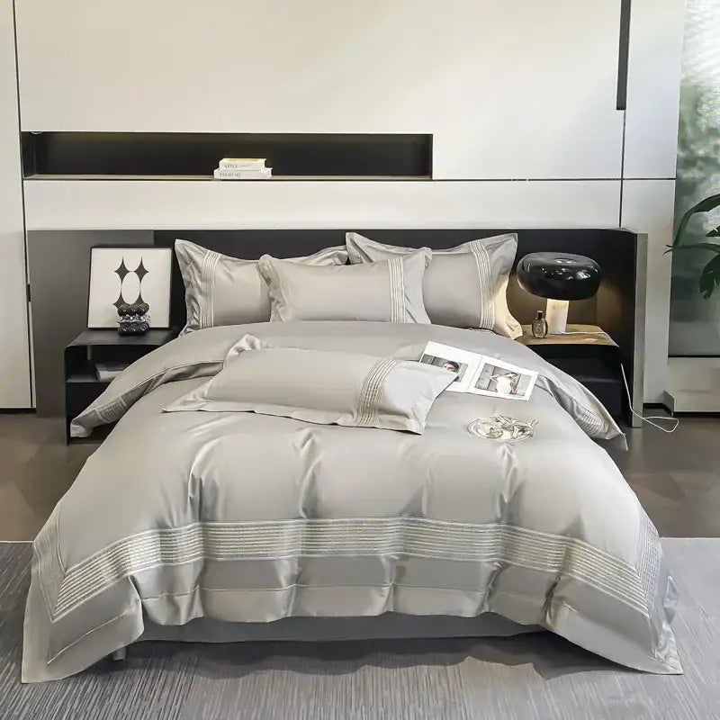 Light blue egyptian cotton embroidery duvet cover bedding set with gray satin-like fabric and subtle horizontal embroidery edges