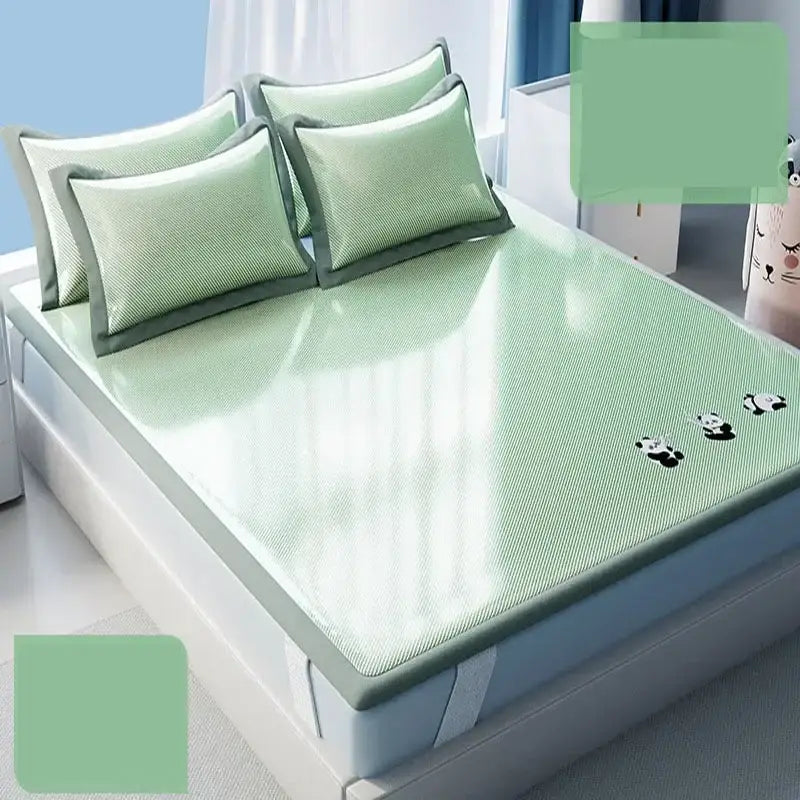 Light green decorbites cooling antibacterial mattress pad with textured surface and small panda appliqués for sleeping