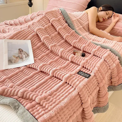 Pink corduroy throw blanket with gray ribbed trim featuring cozy faux rabbit plush texture for decorbites cozy faux decor