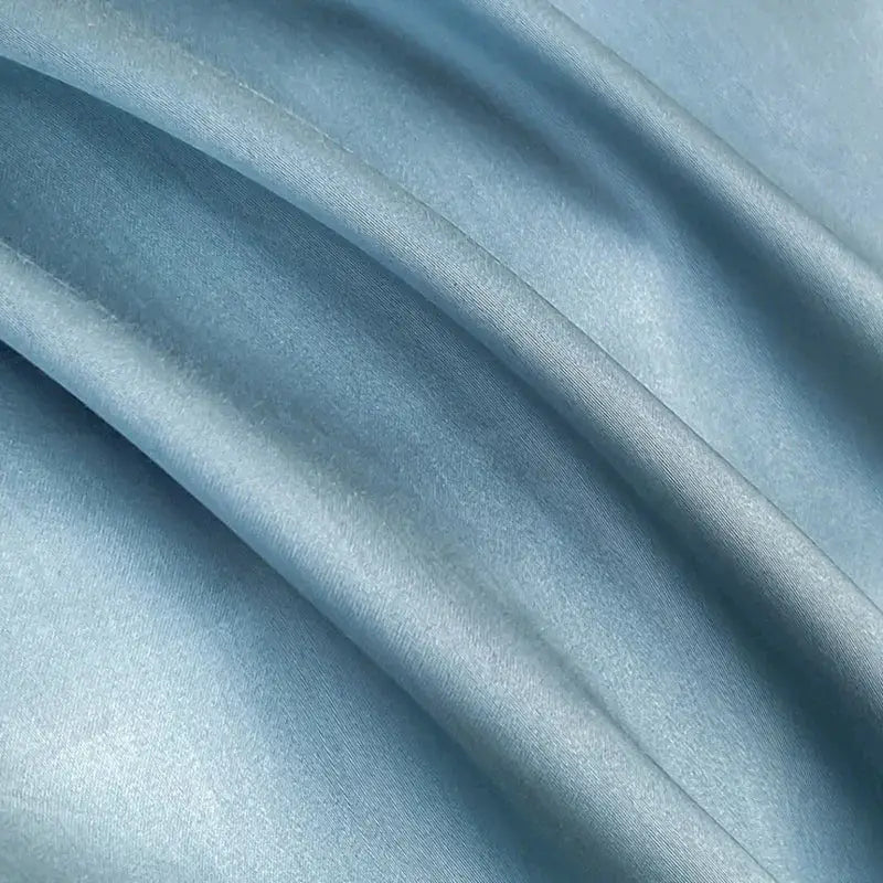 Light blue satin cotton embroidery bedding set with smooth flowing texture and subtle sheen for bedroom decorbites cotton embroidery