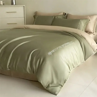 Silk-like sage green duvet cover with subtle white embroidery in light blue satin cotton decorbites cotton embroidery bedding set