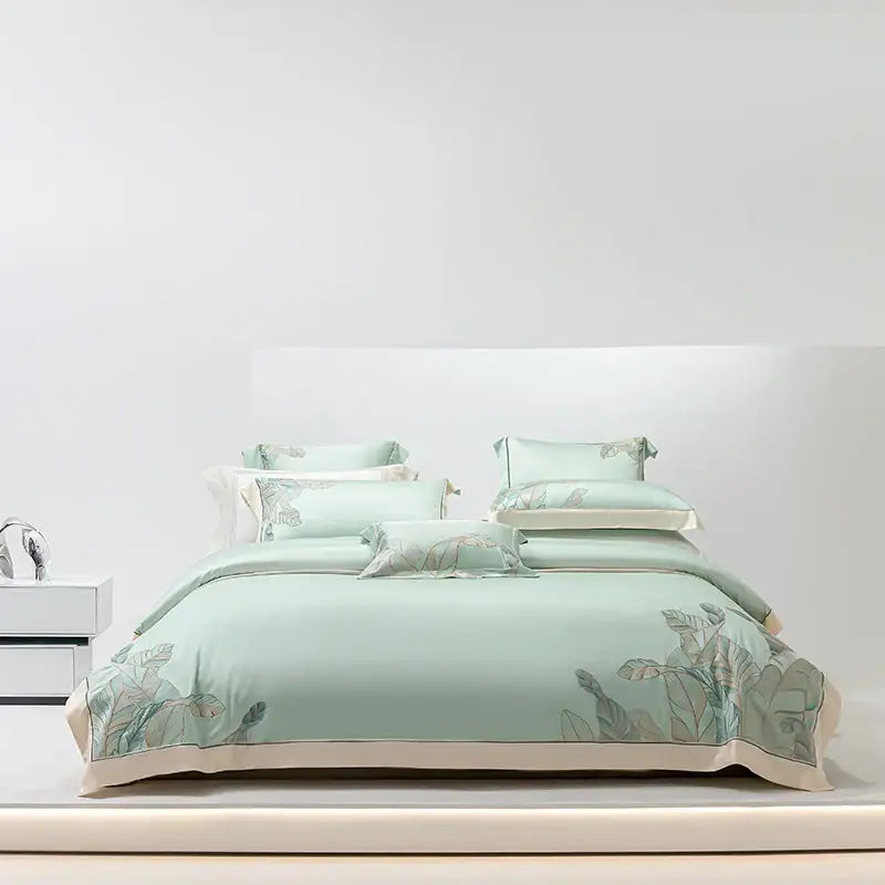 Soft mint green satin bedding set with delicate leaf embroidery and cream border decorbites eucalyptus lyocell soft