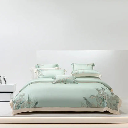 Soft mint green satin bedding set with delicate leaf embroidery and cream border decorbites eucalyptus lyocell soft