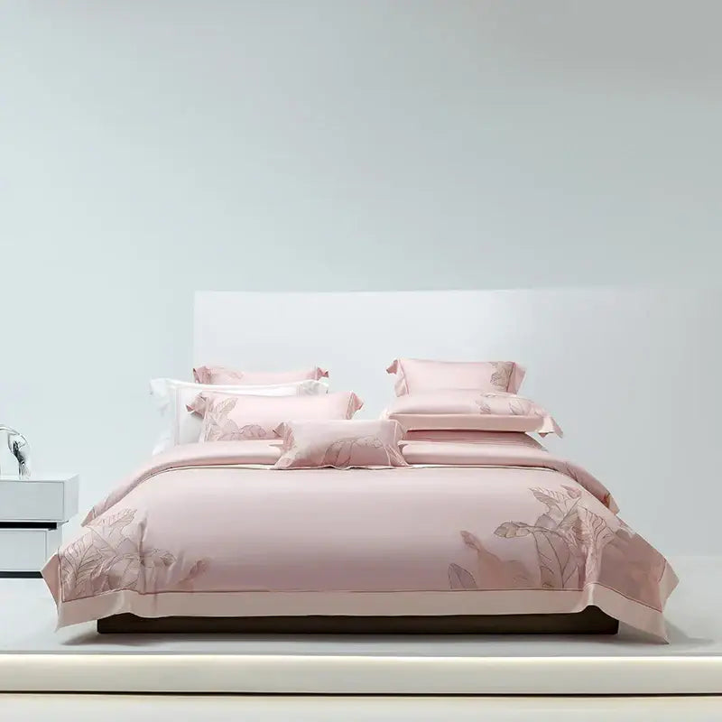Pink satin bedding set with delicate leaf embroidery made from eucalyptus lyocell soft fabric for stylish decorbites decor